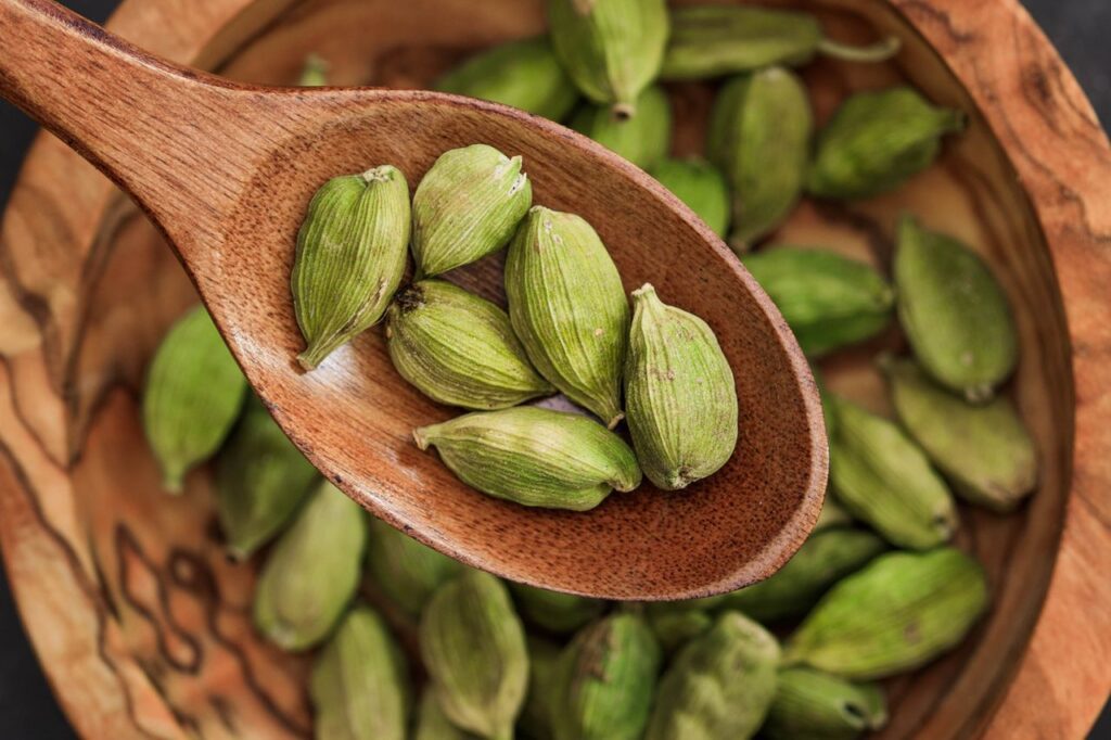 Natural green cardamom pods used for cooking and beverages