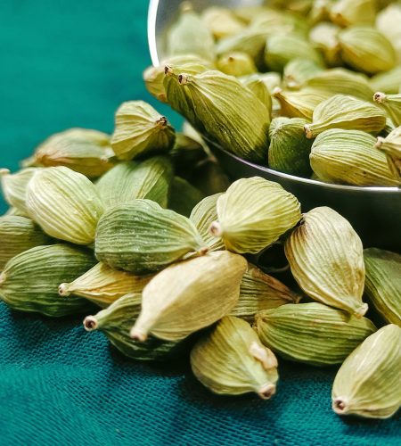 Fresh green cardamom pods, a premium Kerala spice known for its rich aroma and flavour